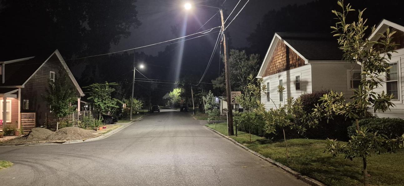 A 150-watt LED streetlight at Alabama and Lawndale Avenues floods the fronts of nearby houses with white light at night